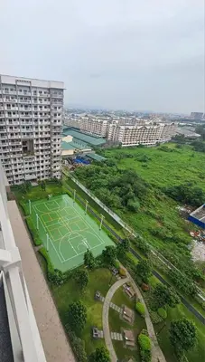 an aerial view of a tennis court in a city at Casa Celestine Staycation in Manila