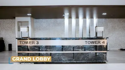a stand for a grand lobby in a building at SM MOA Near NAIA Airports 1 Bedroom with balcony SG Suite 2 at Shore 3 in Manila