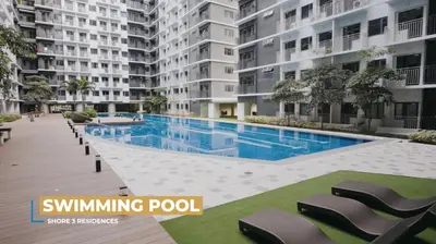 an image of a swimming pool in a apartment building at SM MOA Near NAIA Airports 1 Bedroom with balcony SG Suite 2 at Shore 3 in Manila