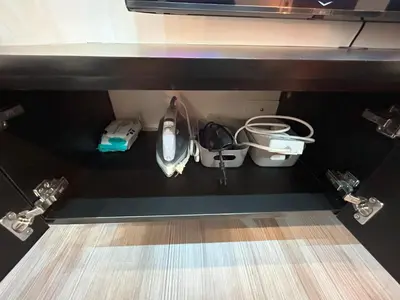 an overhead view of a room with shoes under a desk at Shore 2 Residences - Takya's Staycation in Manila