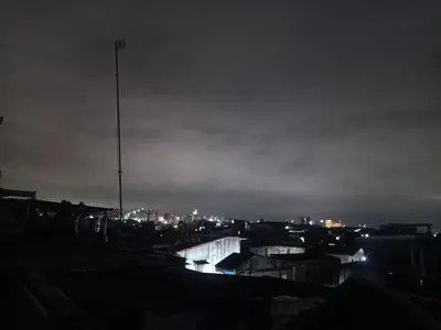 a night view of a city with lights at Dream hotel in Manila
