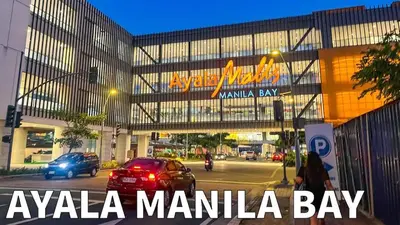 a large building with aania manila bay sign on it at Cozy Family and Group-Friendly Private 2 Bedroom with Coffee Bar and Fast Wifi at S Residences Mall of Asia in Manila