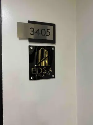 a sign on a wall that reads edsa fires at EDSA Heights Unit 3405 Cozy One Bedroom Penthouse Unit in Manila
