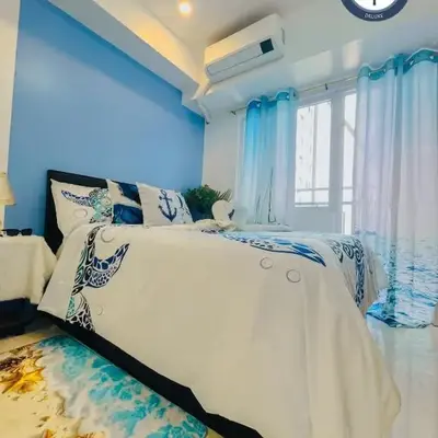 Cozy Condo with Balcony and Bay view plus PS4 at Taft Malate