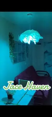 a neon sign in a room with a bed at Jace Haven 1 Room 2 Beds in Binangonan