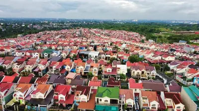 an aerial view of a city with colorful roofs at Fernica Boarding House in Bancal