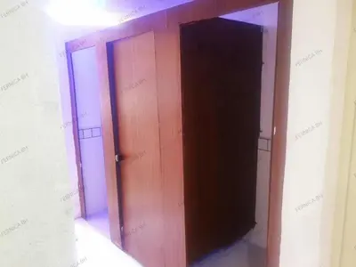 an open wooden door in a room at Fernica Boarding House in Bancal