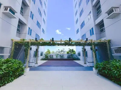 an entrance to an apartment building with an archway at Manila Bay View Shore1 Residence Tower A in Manila