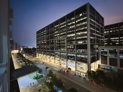 a tall building with a street in front of it at Manila Bay View Shore1 Residence Tower A in Manila
