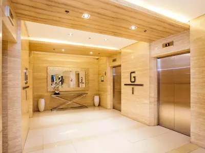 a hallway with a door in a building at Hotel101 - Manila in Manila