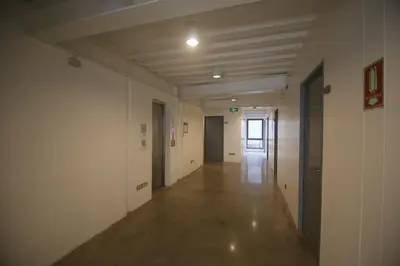 an empty hallway in an office building at Quarto Ph in Manila