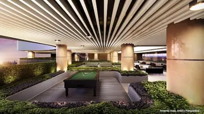 a lobby with a pool table in a building at Skyline Serenity at 52F & Cozy City Escape Views in Manila