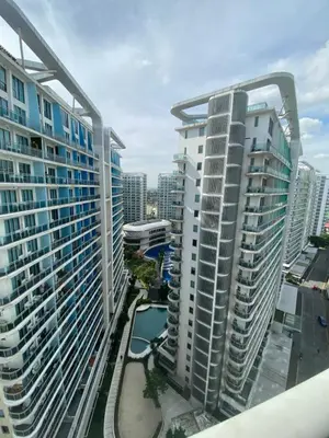 a view of the city from the balcony of a building at Bahamas tower 1604 in Manila