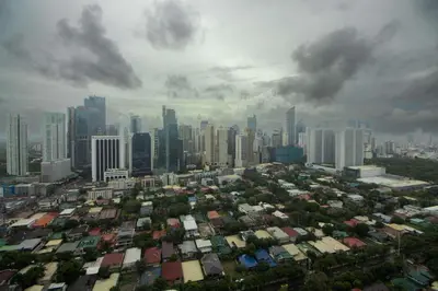 an aerial view of a large city with buildings at Century Spire Condominium, Makati City in Manila