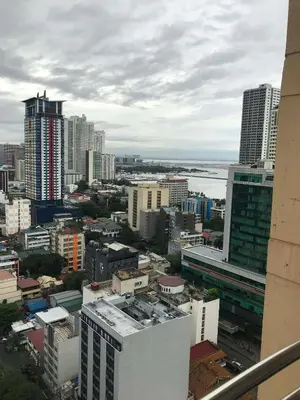a view of a city skyline with buildings at Birch Tower Manila by JL in Manila