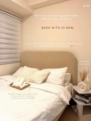 a bed with a book with us now written on it at Vie Yśe - Pinterest-style Staycation Near MOA in Manila