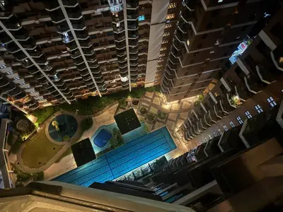 an overhead view of a pool in the middle of a building at Moonsky Suites in Manila