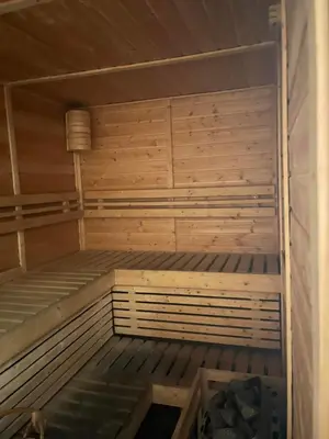 an empty sauna is shown in a room at Modern 1 BR Condo near Airport, MOA, PICC, Star City, OKADA With Fast WIFI & Netflix Free Pool Access in Sampong