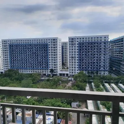 two large tall buildings in a city with trees at 1 Bedroom in S Residences in Manila