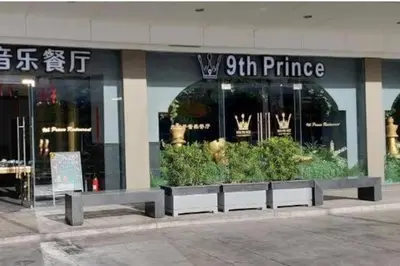 a store front of a store with plants in the window at Pasay City-Shore Staycation Ph in Manila