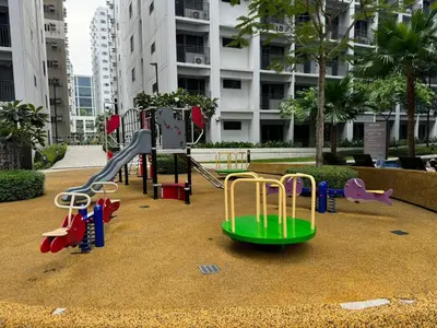 a playground with a slide in a city at Shortstay at Shore 2 in Manila