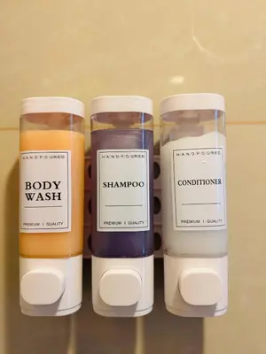 a group of four candles sitting on a table at High-Floor Stay near Okada, Airport, City of Dreams, Solaire and MOA with free pool and gym access in Manila