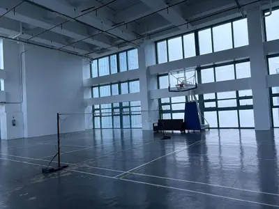 an empty room with a basketball hoop in a building at Aesthetic Modern Suite 1BR One Uptown Residence BGC in Manila