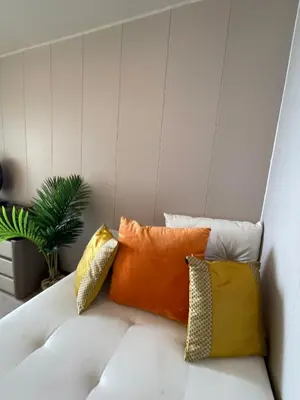 a row of pillows sitting on a couch at Spacious & Luxury 4BR Home across Okada and Solaire in Manila