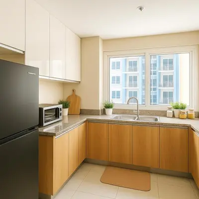 a kitchen with a sink and a microwave at Spacious & Luxury 4BR Home across Okada and Solaire in Manila