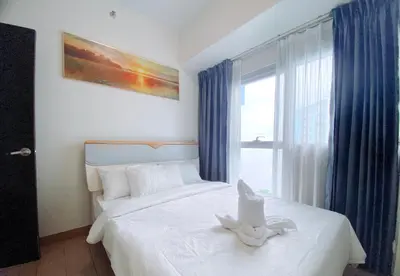a bedroom with a white bed and a window at 120 Sqm Modern 3Bedrooms HighRise Facing Manila Bay, Near Airports, Okada Casino, Solaire Casino, MOA with free parking in Manila