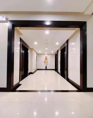 a hallway of a building with a chandelier at 120 Sqm 3Bedrooms Facing Manila Bay Sunset, Airports, Okada, Solaire, MOA, free parking in Manila