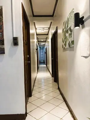 a corridor of a hallway with at Makati Avenue Suites in Manila