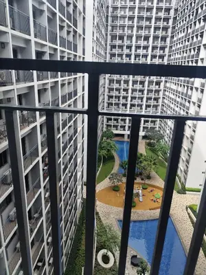 a view from the balcony of a apartment building at Metro Nest Inn in Manila