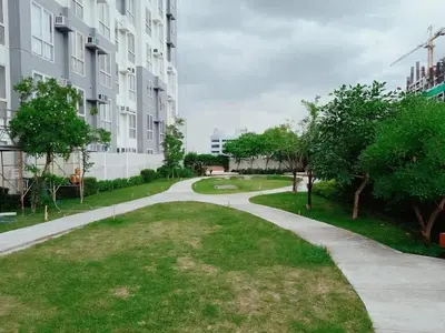 a walkway in front of a building at JC Palace Residences in Manila