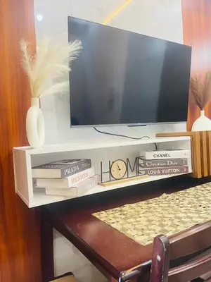 a tv sitting on top of a table at H&M staycation SHORE 2 in Manila