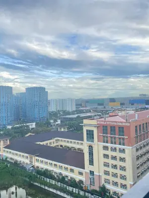 a view of a large building in a city at H&M staycation SHORE 2 in Manila