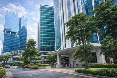 a street in a city with tall buildings at Easyworld One Uptown Residence BGC in Manila