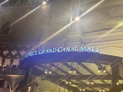 a sign for the grand canadian mall in a building at Stamford Executive Residence a2 shortwalk Venice Canal mall in Manila