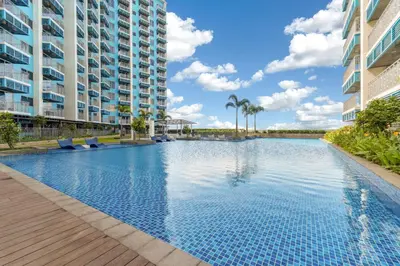 an infinity pool in the middle of a building at Luxurious Staycation near Okada, Airport, City of Dreams, Solaire, and MOA with free pool & gym in Manila