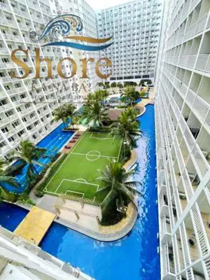 an aerial view of a resort with palm trees at Shore ka na ba in Manila