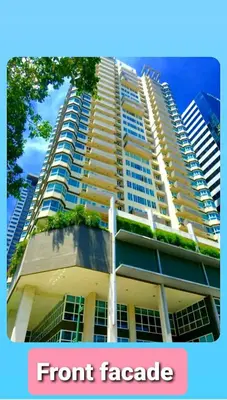a large apartment building with plants on the facade at BGC Forbes Area Your Home Away From Home in the Heart of BGC with hi-speed Wi-Fi PrimeVideo,Disney ,Netflix in Manila
