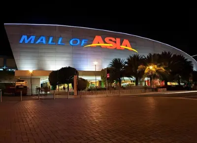 a mall of asahi sign in front of a building at Sy bay suites Near Ayala mall PITX DFA T3T2 Okada MSV2106 in Manila