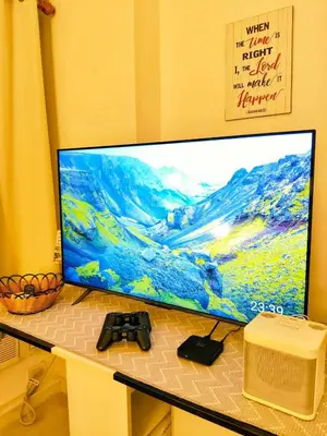 a computer monitor sitting on top of a desk at Vacation in Harmony in Manila