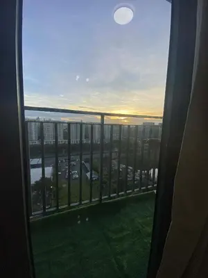 a view of a city from a window of a building at Jay's Staycation at Shore Residences Pasay in Manila