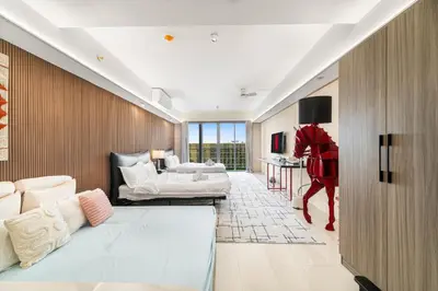 a living room with a couch and a table at Elegant Studio City View near Airport, City of Dreams, Okada, Solaire, PARQAL, Ayala Malls, and MOA in Manila