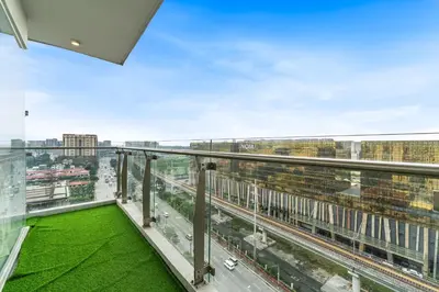 a view from the balcony of a building at Elegant 2BR City View near City of Dreams, Okada, Solaire, PARQAL, Ayala Malls, MOA, and Airport in Manila