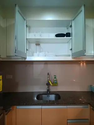 a kitchen with a sink and a counter top at Spacious Studio 3B C5 in Manila