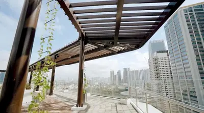 a balcony with a view of a city at Melscape Lush Residence 1BR Unit in Manila