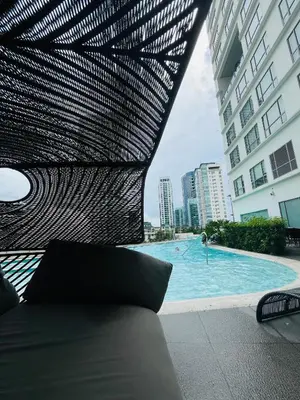 a view of a swimming pool in a building at Hotel Residences at Acqua in Manila