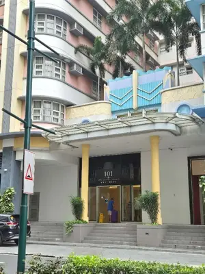 a building with a store in front of it at Jacob's Place Near Manila Airport in Manila